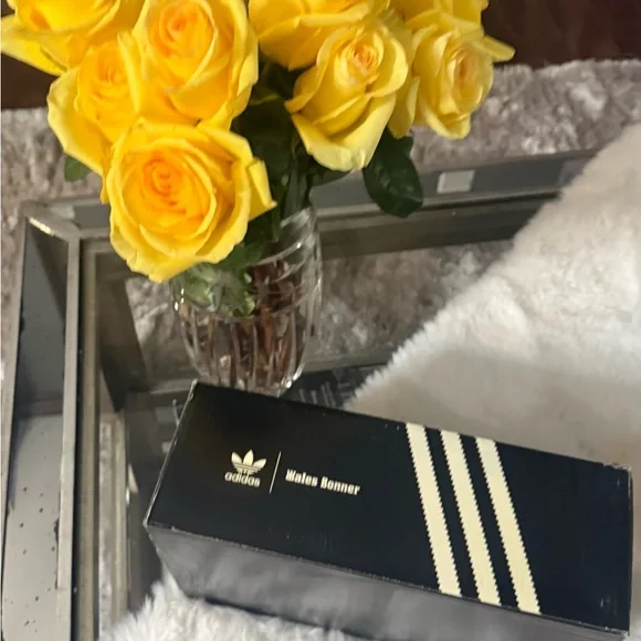Adidas Women's Silver Sneakers screaming attention. Fly for real